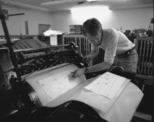 David Wolfe, who printed "Against the Art of War," at work in his studio.