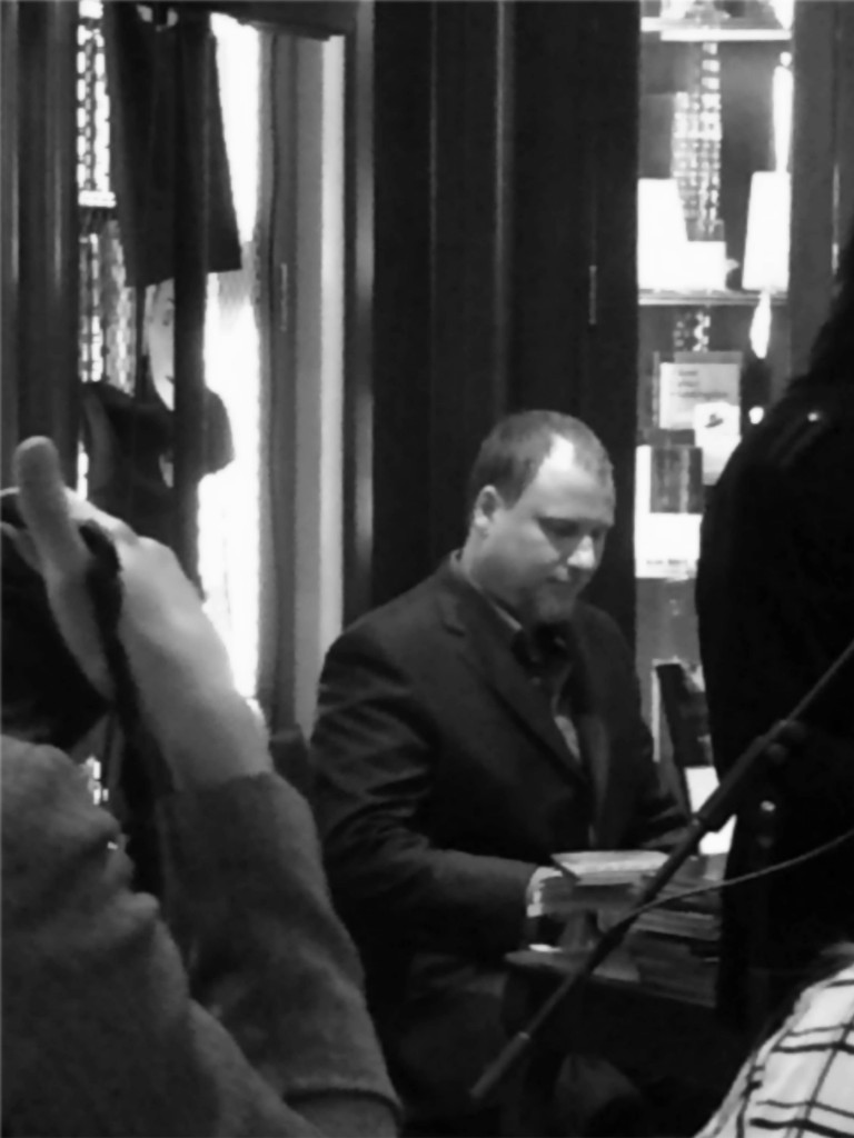 Hilbert signs copies of Caligulan at the New York City launch. 